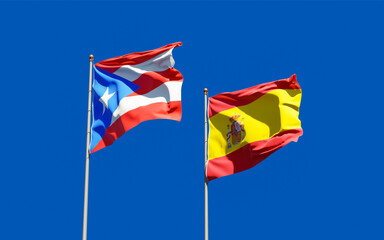 Flags of Puerto Rico and Spain.
