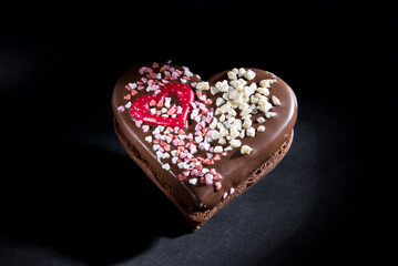 Alfajor for Valentine's Day, black background, in studio, Spain