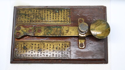 A brass telegram used for communications during second world war using Morse code encryption. Cryptography and message services. © Pranjal