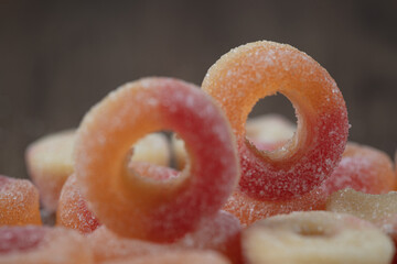 Pinc circle shape jelly beans on the ground