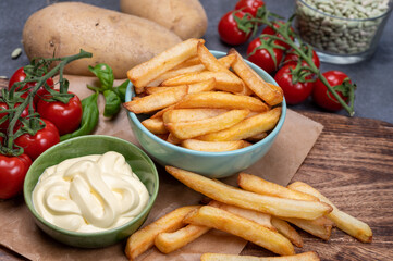 Bown with fresh cooked french fries potato chips with belgian mayonnaise sauce