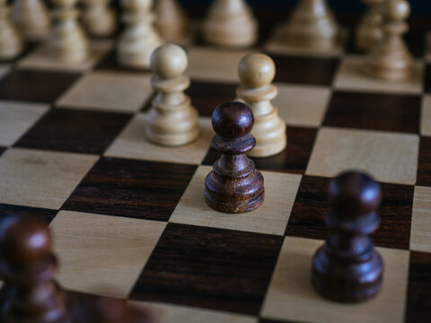 Close-up chess board with Caro Kann defense opening