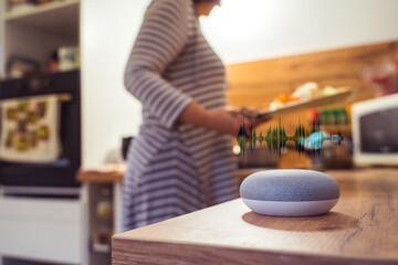 Smart speaker concept in kitchen to help with cooking and baking