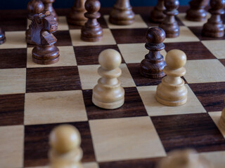 Scottish opening in chess on board and wooden pieces