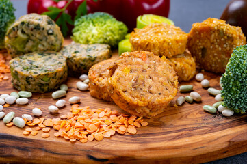 Small tasty vegan and vegetarian burgers made from fresh vegetables and dried legumes and beans