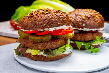 Grilled plant based, meat free vega burgers close up