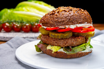 Grilled plant based, meat free vega burgers close up