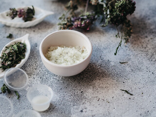 Spa cosmetics: scrub, salt, herbal soap, natural ingredients.