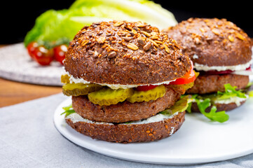 Grilled plant based, meat free vega burgers close up