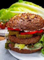 Grilled plant based, meat free vega burgers close up