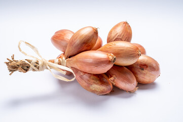 Bunch of French shallots grappe onion from Brittany, France