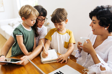 Lesbian couple spending time with their kids