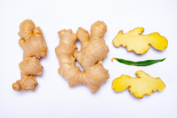 Fresh ginger rhizome root used in traditional medicines and for flavoring meals isolated on white