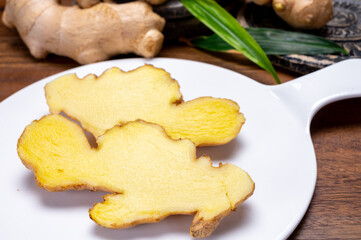 Fresh ginger rhizome root used in traditional medicines and for flavoring meals worldwide.