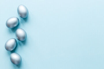 Silver Easter eggs. Easter decoration, top view