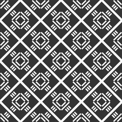 Abstract seamless rhombuses pattern. Tribe motif. Ethnic wallpaper. Ancient mosaic. Ethnical folk image. Tribal ornament. Repeating geometric tiles. Vector monochrome background.