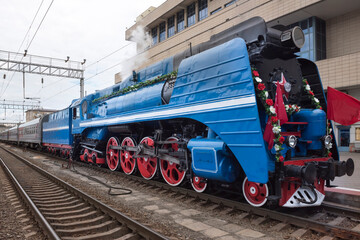   The departure of a passenger train with a steam locomotive P 36 
