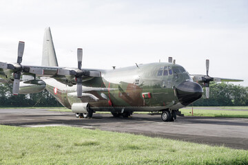 Fototapeta na wymiar Lockheed Martin C-130 Hercules military cargo or tanker plane 