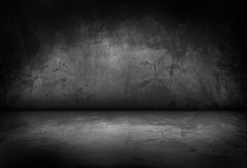 Black, dark and gray abstract cement wall and studio room , interior texture for display products. Room black floor is made of dark plaster.