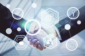 Double exposure of social network theme hologram and handshake of two men.