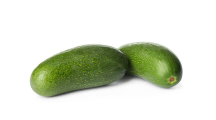 Fresh whole seedless avocados isolated on white