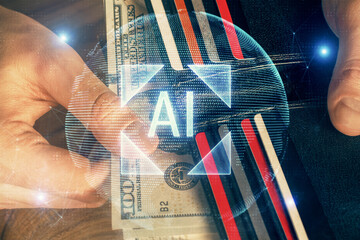 Double exposure of technology drawing hologram and us dollars bills and man hands. Data concept