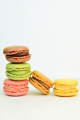 Colorful macarons, sweets, on white background