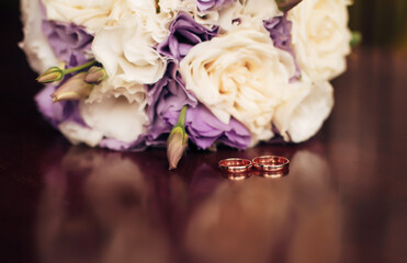 
wedding rings on a stand