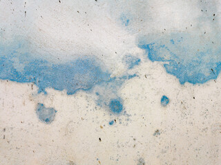 Stone wall texture. Dirty old grey and blue stucco wall. Two colored rough grungy background. 