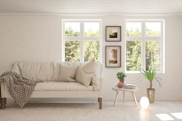 White living room with sofa and summer landscape in window. Scandinavian interior design. 3D illustration