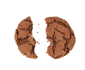 broken round chocolate chip cookies in half on white background