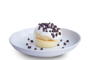 Close-up of Japanese-style pancakes topped with chocolate isolated on white background.