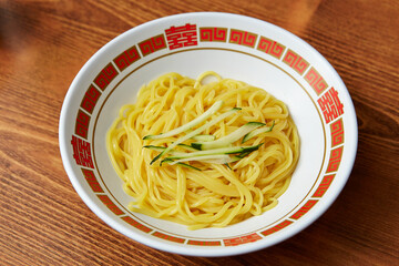 Cucumber garnish on ganjajang noodles