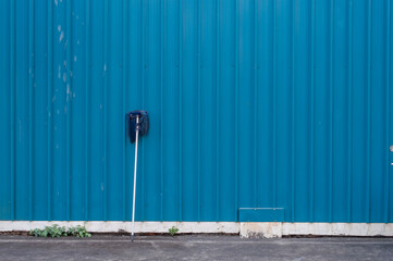 Mop on blue metal background
