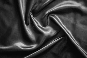 Fototapeta premium Wrinkle black satin cloth texture background