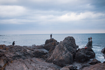 Fototapeta na wymiar person on the rocks