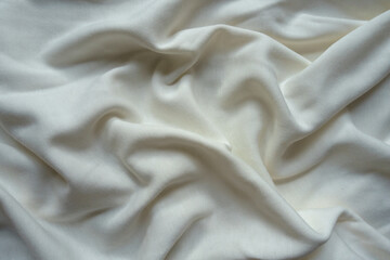 Draped simple white cotton jersey fabric from above