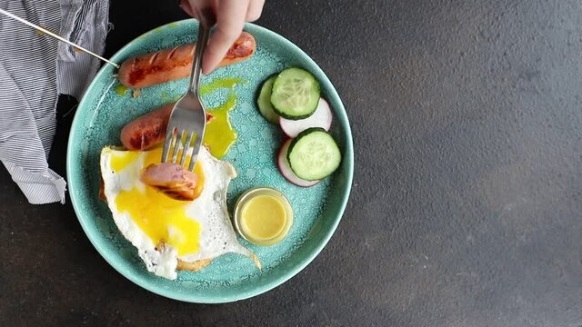 fried eggs breakfast vegetables, bread and sausages, eggs and bread bun croque-monsieur or croque-madam portion on the table cooking meal snack outdoor top view copy space for text food background