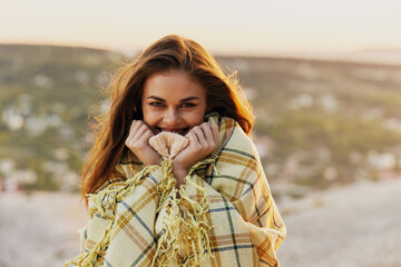 happy woman with fred on nature in the mountains smiling model