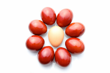 Easter eggs. Brown-colored eggs lie around one unpainted egg on a white background. Conceptual photo: - 