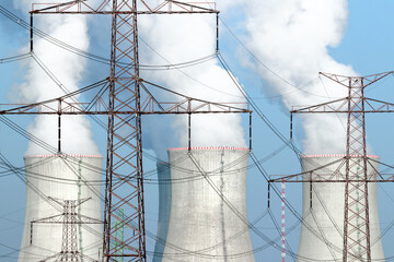 Power lines in front of cooling towers