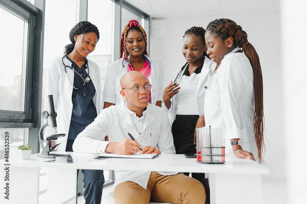 Wall mural African-American black doctor woman and medical group