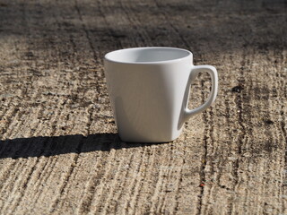 coffee mug on the cement floor