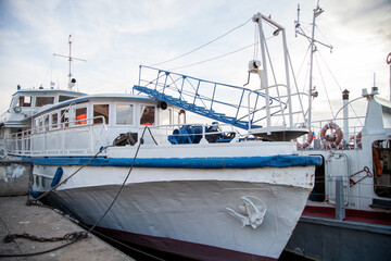 Fototapeta premium ships and boats in the port at the pier