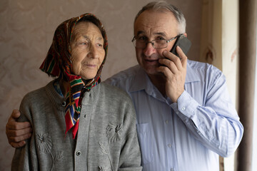 Man hugging his Mother wearing Hijab
