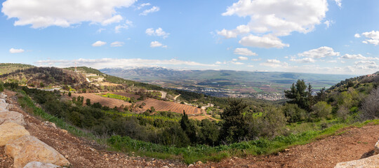 Fototapeta na wymiar Panoramic view from the mountain near the Israeli Margaliot village to the valley in the Upper Galilee in northern Israel