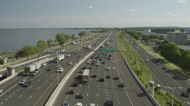 Forward Aerial Pan of Cars Driving on a Highway in New Haven Connecticut
