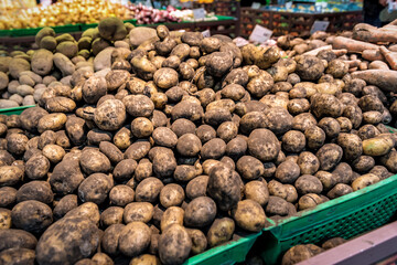 heap of potato in supermarket