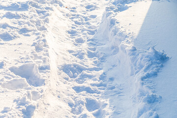 Fototapeta na wymiar snowy winter road in a winter field
