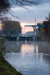 Fototapeta na wymiar Vintage traditional drawbridge in Rijkevorsel Belgium at sunset. High quality photo